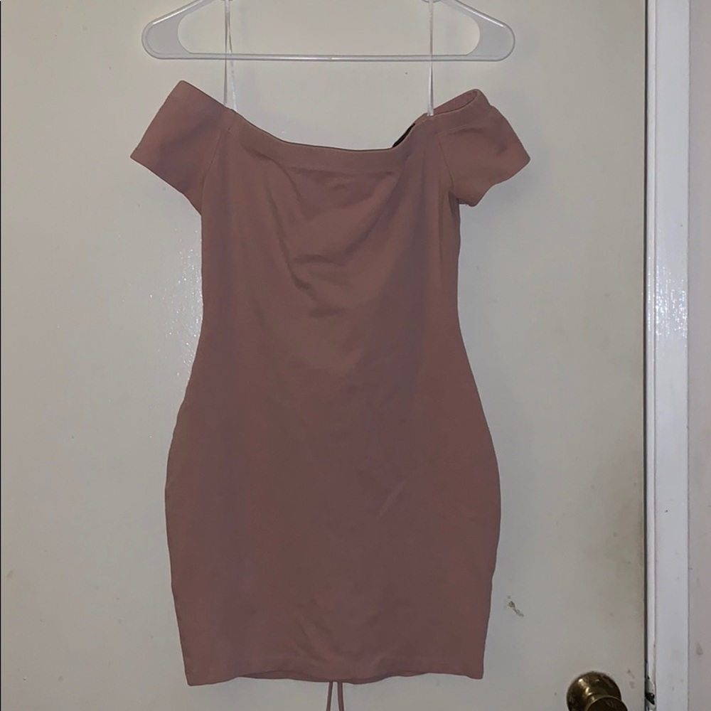 Soft pink mid dress with open lace in the back. (: